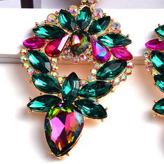 Brand Name: Behind youMetals Type: Stainless SteelMetals Type: Zinc AlloyOrigin: CN(Origin)Style: TRENDYFine or Fashion: FashionModel Number: E2000682Item Type: EarringsEarring Type: Drop EarringsShape\pattern: IrregularMaterial: RhinestoneGender: WomenTechnology: Long Colorful CrystalsType: New Style Luxury Multicolor Earrings For Celebration, Crystal Drop Earrings Wedding, Emerald Green Earrings, Statement Earring, Sparkle Earrings, Crystal Accessories, Green Earrings, Crystal Drop Earrings, Rhinestone Jewelry