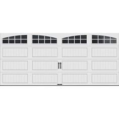 a white garage door with three windows