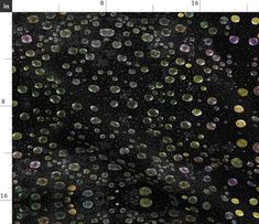 an image of many bubbles floating in the air on a black background with white and yellow dots