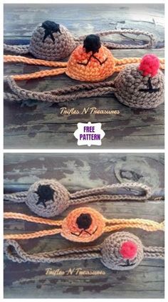 two crocheted birds sitting on top of each other, one is black and the other is orange