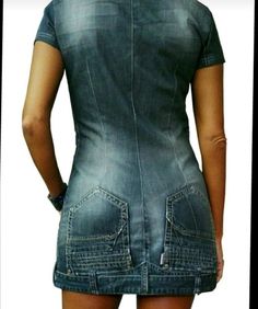 the back of a woman's jean dress