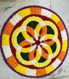 a colorful flower design on the floor