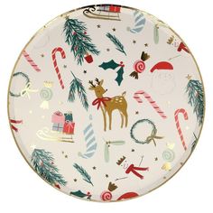 a white plate with christmas decorations and reindeers on the front, surrounded by candy canes