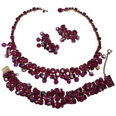 Enticing, vibrant fuchsia rhinestones are the foundation for this amazing display of aurora borealis faceted dangles layered throughout this fabulous necklace, link bracelet, and cluster clip earrings parure. From the Juliana line by DeLizza and Elster. Measurements: Earrings - 3.5cm x 1.9cm, clip-ons Bracelet - 18.0cm x 1.8cm, fbox clasp Necklace - 41cm length, 2.1cm drop, hook clasp 1940s Jewelry, 1970s Jewelry, Juliana Jewelry, 1950s Jewelry, 1960s Jewelry, Vintage Jewelry Crafts, Vintage Bangles, Clasp Necklace, Retro Jewelry