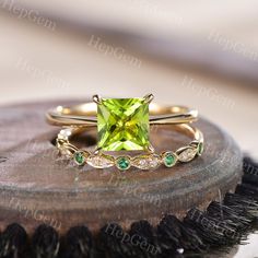 Princess Peridot Ring Set,Silver Rose Gold Bridal Set,Peridot Solitaire Ring Set,Half Eternity Emerald Ring,Birthstone Wedding Ring Gift Specifications: ►Sold As a Natural Peridot Engagement Ring Set(This purchase includes 2 PCS ring.) Engagement Ring ►Material: Available in Silver & Solid 10K/ 14K/ 18k Rose/Yellow,/White,Gold ►Center stone: Princess Cut [7mm] Natural Peridot. 1.25Carat.(Approx.) ►Band Width: Approx. 1.6mm(Bottom) ►Prong Setting,micro pave Wedding Ring ►Material: Available in Si Green Stackable Rings With Round Cut For Weddings, Elegant Peridot Birthstone Ring For Wedding, Elegant Peridot Wedding Birthstone Ring, Wedding Jewelry With Peridot In Halo Setting, Green Stackable Wedding Rings Fine Jewelry, Green Stackable Wedding Rings For May Birthstone, Green Stackable Rings For Wedding And May Birthstone, Yellow Gold Peridot Stackable Rings For Wedding, Wedding Jewelry With Prong Set Peridot