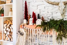 a room with white brick walls and christmas decorations