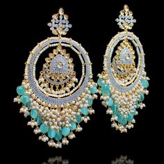 Grace, elegance and charm combined to create these ethnic beauties! Royal and beautiful chaand-bali earrings embellished with kundan stones together with turquoise onyx beads. Approximate earrings length is 5". Gold-plated on high-quality brass as base metal. In-stock & ready-to-ship. *Please Note: We use faux stones and beads in all of our jewelry. Ethnic Beauty, Bali Earrings, Onyx Bead, Faux Stone, Base Metal, Onyx, Bali, Gold Plate, Plating