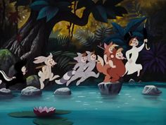 disney's the little mermaid and other animated characters are standing on rocks in front of water