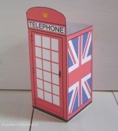 a phone booth with the british flag painted on it's front and side panels