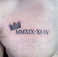 a man with a crown tattoo on his chest saying mmmxix xi - iv