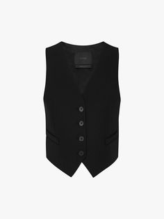 MO&Co. Noir Women's Paneled Belted Waistcoat Inspired by traditional suiting, this piece features a luxurious wool blend fabric and a satin back panel with an adjustable waist tab. The deep V-neck adds a sophisticated touch. Pair it with jeans for a stylish, casual look, or wear it with your pants. Features : - V-neckline, button closure- Back adjustable belt tab- Wool blend materials Code: MBD1WAI007 & MBD1WAI008The back length of size S is 38cmMATERIALS & CARE Material: Front patch: 100% Wool Waistcoat Back View, Tailored Black Vest With Button Closure, 1830s Waistcoat, Black V-neck Vest With Button Closure, Black Waistcoat, Classy Fits, Suit Waistcoat, Adjustable Belt, Back To Black