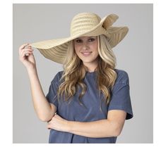 Elevate your sunny day style with this wide wired-brim, round-crown floppy hat. Crafted from a blend of paper and polyester, this chic accessory features an adjustable size and an open paper weave for a breathable, fashionable look. From San Diego Hat Co. Woven Sun Hat For Spring Garden Party, Spring Sun Straw Hat, Woven, Spring Wide Brim Sun Hat In Natural Color, Spring Woven Straw Sun Hat, Woven Sun Hat For Spring Warm Weather, Spring Woven Sun Hat For Warm Weather, Chic Natural Sun Hat For Warm Weather, Chic Natural Color Sun Hat For Warm Weather, Woven Straw Hat With Curved Brim For Spring