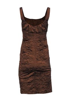 Get ready to turn heads in this sexy siren of a dress! Featuring a stylish brown crinkle fabric, this sleeveless midi dress is perfect for any cocktail party. The side ruching adds a flirty touch, while the open toe mule heels and mini bag complete the look. Step out in style and confidence with Nicole Miller. Size 4 Shell 52% Acetate, 44% Nylon, 4% Lycra Lining 100% Polyester Invisible zipper back Bust 30" Waist 27" Shoulder to hem 38.5" Brown Party Dress With Ruched Bodice, Brown Sleeveless Dress With Ruched Bodice, Elegant Brown Ruched Midi Dress, Formal Brown Ruched Midi Dress, Brown Ruched Midi Dress For Date Night, Brown Ruched Midi Dress For Night Out, Brown Ruffled Midi Dress For Party, Fitted Brown Pleated Midi Dress, Sleeveless Brown Midi Dress With Ruffles