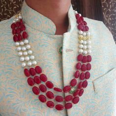 Multistrand Groom Jewelry, Indian Wedding Jewelry, Pakistani Groom Necklace, Long Necklace, Designer Fashion Jewelry, Sherwani Necklace 3 Layered Stone Pearl Beads Necklace An elegant pearl beads necklace with the most stunning festoon. The perfect accessory for your occasion. This necklace is handcrafted with love Necklace Length: Choose from the drop-down menu (comes with adjustable back Dori/cord) (Length of the necklace in the image is 24 inches) Package: 1 Necklace Material: Premium Pearl beads, stone Care: Store in an airtight plastic bag or box. Keep away from water, moist place & fragrance For Express shipping, the option is available in the drop-down menu at checkout. If you need any help regarding placing an order or express shipping, feel free to message us. DISCLAIMER: This pro Groom Jewelry, Jewelry Indian Wedding, Red Hoop Earrings, Jewelry Pakistani, Indian Necklace, Bollywood Jewelry, Pakistani Jewelry, Red Necklace, Indian Wedding Jewelry