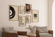 a living room filled with furniture and pictures on the wall