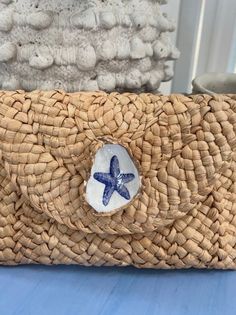 Unique one-of-a-kind oyster shell woven clutch purse. This purse is perfect for your upcoming girls trip, bachelorette party, vacation, cruise, beach or coastal wedding, or trip to a beach resort, and is a perfect addition to this summers beachy fits.  The straw purse has been woven by overseas artisans and finished off with an decoupage oyster that is unique and one-of-a-kind with a nautical touch.   I have many options to choose from if you don't like one of the shell design options that you s Blue Rectangular Clutch For Vacation, Summer Woven Clutch For Beach, Summer Beach Woven Clutch, Summer Woven Beach Clutch, Summer Beach Pouch Clutch, Summer Beach Bags With Shell Material, White Straw Clutch Bag For Beach, Handmade Summer Beach Clutch, Blue Pouch Clutch For Beach