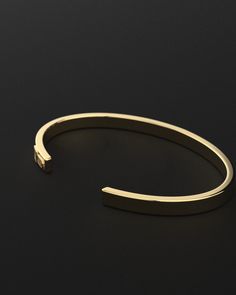 Whether you're looking for a traditional look or something newer, this cuff for men is a timeless piece of jewelry that you can wear for official events and everyday life.When choosing a men's jewel, ensure the style and material match your outfit. Choosing a comfortable men's bracelet is essential in ensuring it fits perfectly.Their exteriors and minimal shape allow the precious metal plating to shine through. You can wear them alone or with other minimal accessories with similar tones. This is Timeless Adjustable Cuff Bracelet With Strap, Timeless Adjustable Cuff Jewelry, Classic Bracelet Wristband, Timeless Adjustable Cuff Bracelet, Adjustable Open Cuff Bangle For Formal Occasions, Timeless Open Cuff Bangle With Polished Finish, Timeless Cuff Jewelry Gift, Timeless Cuff Jewelry As Gift, Classic Everyday Luxury Bangle