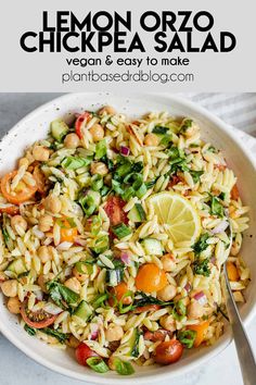 a white bowl filled with lemon orzo chicken salad