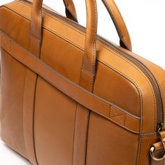 Elevate your professional look with our Shiny Classic Eco-Leather Work Bag, your perfect partner for a seamless transition from boardroom to after-hours. Backed by a lifetime warranty and trade-back options. Classic Leather Laptop Bag With Smooth Grain, Professional Leather Satchel For Work, Professional Leather Shoulder Bag For Work, Timeless Leather Laptop Bag For Everyday, Classic Everyday Laptop Bag With Top Handle, Classic Everyday Laptop Bag With Top Carry Handle, Timeless Leather Bag For Work, Everyday Timeless Leather Laptop Bag, Professional Leather Satchel For Everyday Use