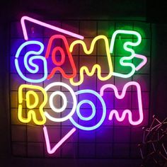 a neon sign that says game room on it