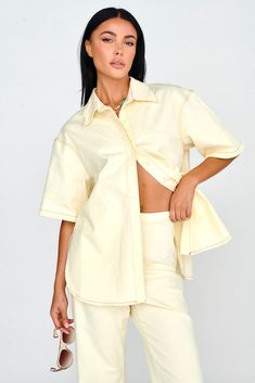 Light Aura Button Up Shirt Buttermilk Spring Loungewear Shirt With Button Closure, Oversized Button-up Top For Brunch, Beige Relaxed Fit Top For Brunch, Spring Loungewear Button-up Blouse, Cream Collared Shirt For Summer, Collared Cream Shirt For Summer, Summer Cream Collared Shirt, Spring Button-up Blouse For Loungewear, Chic Relaxed Fit Shirt For Brunch