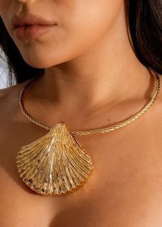 Dive into timeless elegance with the "Tides Shell Necklace," a piece that beautifully captures the essence of coastal luxury. Featuring a stunning gold-toned shell pendant, this necklace brings the serene beauty of the ocean to your wardrobe. The twisted rope chain adds a touch of nautical charm, while the lustrous finish ensures you’ll stand out whether you’re at a beachside soirée or a chic city event. Model measurements, height and weight located in size chart Order ships within 24-48 hours or sooner (Monday-Friday) Coastal Luxury, Diva Boutique, Lace Cutout, Concert Fits, Leather Floral, Shell Necklace, Tall Girl, Long Crop Top, Boutique Online