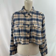 Elevate Your Wardrobe With This Nwot American Eagle Cropped Flannel Button Shirt In Size Xl. The Blue And Tan Plaid Pattern Adds A Touch Of Classic Style, While The Relaxed Fit And Long Sleeves Make It Perfect For Travel, Workwear, Or Casual Occasions. The Shirt Features A Collared Neckline, Casual Sleeve Type, And Oversized Design With Pockets For Added Convenience. Made Of 100% Cotton Flannel, This Shirt Is Easy To Care For And Has A Colorful Outdoor Theme. The Button-Up Style And Accents Prov Blue Shirt For Fall, Blue Flannel Shirt With Pockets For Fall, Blue Relaxed Fit Flannel Shirt For Fall, Blue Collared Flannel Shirt For Fall, Trendy Blue Flannel Shirt For Fall, Blue Long Sleeve Flannel Shirt For Fall, Blue Flannel Tops For Fall, Oversized Blue Long Sleeve Flannel Shirt, Oversized Blue Flannel Long Sleeve Shirt