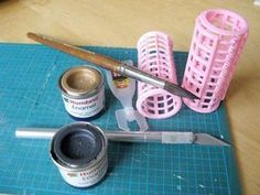 the tools are sitting on the cutting board ready to be used for making decorative items