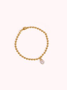 A delightful addition to your bracelet collection, our Brookes bracelet is sure to become one of your favorites. The ball chain introduces a cheerful element, complementing the pearl pendant's sophistication. Freshwater Pearls AAA Luster Pearls 14K Gold Filled Bracelet Length: 7" Please note - Freshwater Pearls & Gemstones are all natural and therefore unique, your Adorn Pili piece will be a one of one design. Elegant Pearl Jewelry With Ball Chain, Gold Pearl Bracelet With 14k Gold Chain, Dainty Yellow Gold Beaded Bracelets With Pearl Charm, Elegant Ball Chain Bracelet As Gift, Elegant Ball Chain Bracelet Gift, Gift Pearl Bracelet With Beaded Chain, Yellow Gold Beaded Bracelets With Pearl Charm, Yellow Gold Pearl Beaded Bracelets With Pearl Chain, 14k Gold Pearl Bracelet With Pearl Charm As Gift