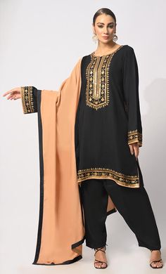 Indulge in the epitome of ethnic elegance with our exquisite 3-piece Salwar Kameez set. Intricately crafted, the Kameez boasts machine embroidery, handwork motifs, and delicate moti and CD embellishments adorning the front placket, exuding opulence and sophistication. Enhancing its allure, the Kurta features side pockets for modern convenience and intricate handwork detailing on the hem for added charm. Accompanied by a Piping matching dupatta, this ensemble effortlessly blends tradition with co Handwork Motifs, Black Salwar, Black Salwar Kameez, Kids Abaya, Mens Items, Don't Compare, Kids Items, Womens Tunics, Salwar Kameez