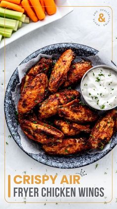 crispy air fryer chicken wings with ranch dip and carrots on the side