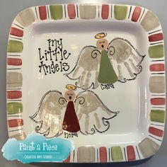 a plate with two angels painted on the front and back of it that says, my little angels