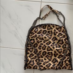 New Cheetah Shoulder Bag Brand New Never Used Leopard Print Pouch Shoulder Bag For Daily Use, Brown Top Handle Bag With Chain Strap, Brown Shoulder Bag With Chain Strap For Daily Use, Brown Satchel With Chain Strap For Daily Use, Daily Use Brown Satchel With Chain Strap, Brown Chain Strap Satchel For Everyday Use, Brown Double Handle Shoulder Bag With Chain Strap, Brown Shopping Bag With Chain Strap, Brown Chain Strap Bag For Shopping