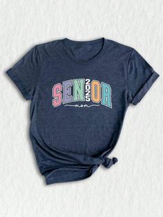 a women's t - shirt with the word senior on it