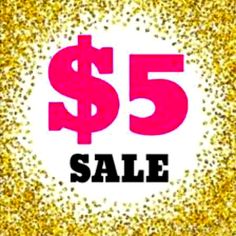 a $ 5 sale sign with gold glitter