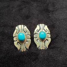 Vintage Navajo Tommy Singer Sterling Silver Earrings. Intricate Details With Beautiful Turquoise Color Stone. Postback Earrings, Showing Little Wear Considering Age. Will Be Shipped With Extreme Care. Unique Blue Earrings Stamped 925, Southwestern Multicolor Sterling Silver Earrings, Vintage Turquoise Multi-stone Jewelry, Nickel-free Blue Southwestern Earrings, Nickel-free Turquoise Southwestern Earrings, Turquoise Southwestern Nickel-free Hoop Earrings, Vintage Navajo, Turquoise Color, Vintage Earrings