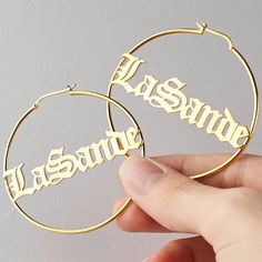 Lets make our lives more beautiful with custom/personalized items. This can bring you a lot of joy when you see your name or your loved once name on the item.  Having your personal touch on a piece of jewelry really makes a difference.  Item:-   Old English Name Earrings Hoop Diameter:- 30-40-50-60-70-80-90-100 MM Metal:- Stainless Steel Finished:- Platinum-Rose Gold-Gold We have make 2 different name on1pair Please Explain your Name & Font No. On Personalization Box. Like This-   Abdul   Font # Earrings Name, English Name, Letter Earrings, Name Earrings, Initial Earrings, Earrings Bridesmaid, Earrings Hoop, Name Jewelry, Custom Earrings