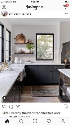 an instagram page with black cabinets and white countertops