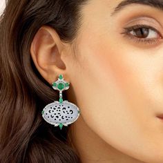 For Sale on 1stDibs - These stunning hand carved Jade earrings are crafted in 18-karat gold. It is set in 14.99 carats Jade, 3.03 carats emerald and 2.44 carats of sparkling Luxury Carved Earrings, Luxury Carved Earrings For Formal Occasions, Elegant Carved Earrings For Formal Occasions, Elegant Round Carved Earrings, Elegant Carved Round Earrings, Elegant Silver Carved Earrings, Green Diamond Earrings With Intricate Design, Elegant Carved Yellow Gold Earrings, Formal Carved Yellow Gold Earrings