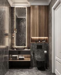 a bathroom with marble walls and flooring