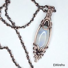 Bohemian Oval Wire Wrapped Necklace, Artisan Wire Wrapped Oval Pendant Necklace, Silver Agate Wire Wrapped Necklace, Spiritual Glass Necklace With Wire Wrapped Detail, Fantasy Pendant, Wire Wrapped Labradorite Oval Pendant Necklace, Black Leather Necklace, Natural Stone Jewelry