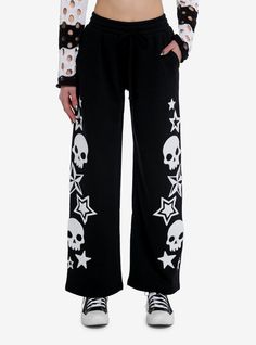 Even baddies need time to relax every now and then! These black  wide leg lounge pants feature fuzzy white patches of skulls and stars down the legs. Comes with an elasticated waistband and side seam pockets.55% cotton; 45% polyesterWash cold; dry lowImportedListed in junior sizesModel is 5'10''Model wears size Small Hot Topic Pants, Emo Pants, Scene Pants, Girls Lounge, Girls Loungewear, 2000s Scene, Star Pants, Androgynous Outfits, Patch Pants