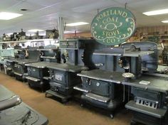 there are many old stoves in the store