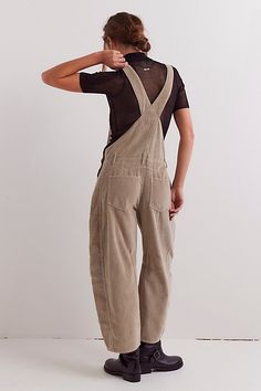 Our top-rated Good Luck Overalls — now in a textured corduroy fabrication! Featuring the signature barrel-leg fit, you’ll reach for this pair all season long. **Fit:** Bib-and-brace design with wide barrel-leg **Features:** Front bib pocket, tapered knee design, adjustable brace straps, side button detailing, soft cord fabrication **Why We ❤ It:** Toughened-up with moto boots or laid-back with sporty sneakers, this pair has endless ways to wear. | We The Free Good Luck Cord Overalls at Free People in Green, Size: L Carhartt Overalls Women, Mechanic Overalls, Cord Overalls, Leather Overalls, Work Overalls, Carhartt Overalls, Corduroy Dungarees, Overalls Vintage, My 30s