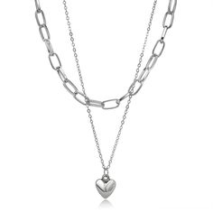 This shimmering silver-plated necklace brings hearts and chains to your jewelry collection. Pendant : 0.79" L Smallest chain: 16.93" L with 1.96" extender Largest chain: 17.12" L with 1.96" extender Lobster claw clasp Silver-plated copper Layer Chain, Heart Choker Necklace, Layered Chain Necklace, Color Heart, Heart Choker, Layered Chains, Fashion Female, Silver Plated Necklace, Geometric Jewelry