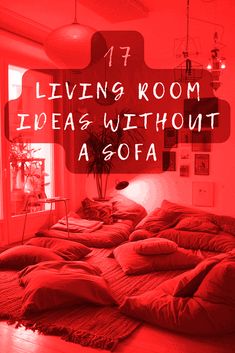 a bedroom with red walls and lots of pillows on the bed in front of it