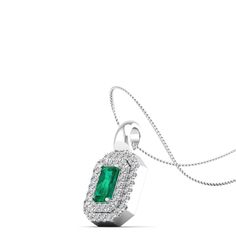 This exquisite emerald and diamond pendant features a stunning pear-shaped emerald surrounded by a halo of sparkling diamonds. The vibrant green of the emerald combined with the brilliance of the diamonds creates a timeless and elegant piece that will surely make a statement. Metal: 14K Gold Setting Type: Prong Rhodium Finish: Yes, on White Gold Gemstone Details: Gemstone: Emerald Shape: Emerald Cut Average Dimensions: 5.00 x 3.00 MM Quantity: 01 Average Cut: Very Good Average Color: Medium to D Green Emerald Necklace With Diamond Halo Setting, Dance Jewelry, Double Halo, Birthstone Gifts, Ring Pendant Necklace, Vibrant Green, Sparkle Diamonds, Mens Wedding Bands, Bridal Rings