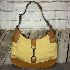 Yellow & Tan Coach Shoulder Bag. Inside Is In Good Condition. Outside On Leather Has Two Small Water Stains. Slight Vintage Smell. Handle Needs Shaped. No Holes. Look Carefully At The Pictures Before Purchasing. See Photos Below For Details. Yellow Coach Satchel Shoulder Bag, Coach Yellow Satchel Shoulder Bag, Yellow Coach Shoulder Bag With Double Handle, Yellow Coach Bag With Gold-tone Hardware, Yellow Coach Shoulder Bag, Coach Yellow Double Handle Bag, Yellow Coach Shoulder Bag With Gold-tone Hardware, Coach Yellow Double Handle Shoulder Bag, Coach Yellow Bag With Gold-tone Hardware