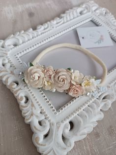 Beautiful set of baby flower headband and dress belt. Both for special occasions like baptism or wedding and on a daily basis. Made of the highest quality mulberry paper  flowers with the addition of small pearls.  Headband is made on nylon headband which is super soft and stretchy. It's a one size fits all (newborn to teen) Dress decoration is made on white satin ribbon. If you prefer different colour, please write me a message.  *You can buy whole set or separately headband or dress belt.  You Handmade Adjustable Headband For Weddings, Elegant Hair Accessories With Handmade Flowers And Adjustable Fit, Handmade Flower Headband For Wedding, Elegant Handmade Adjustable Hair Accessories, Handmade Flowers Wedding Hair Accessories, Elegant Handmade Flowers Headband Gift, Elegant Adjustable Hair Accessories For Baptism, Elegant Adjustable Hair Accessories With Handmade Flowers, Elegant Adjustable Headband With Handmade Flowers