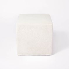 a small white stool on a white background with room for text or image to be added